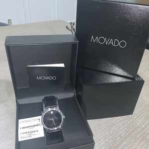 Movado watch. Swiss movement. Black leather band.